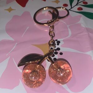 Sparkling Cherry Keychain with Gold Details